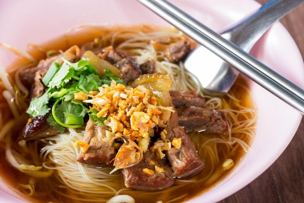 Hoi An’s cuisine is a blend of rich flavors, unique textures, and fresh ingredients, reflecting the town’s diverse cultural influences. (Source: Freepik)